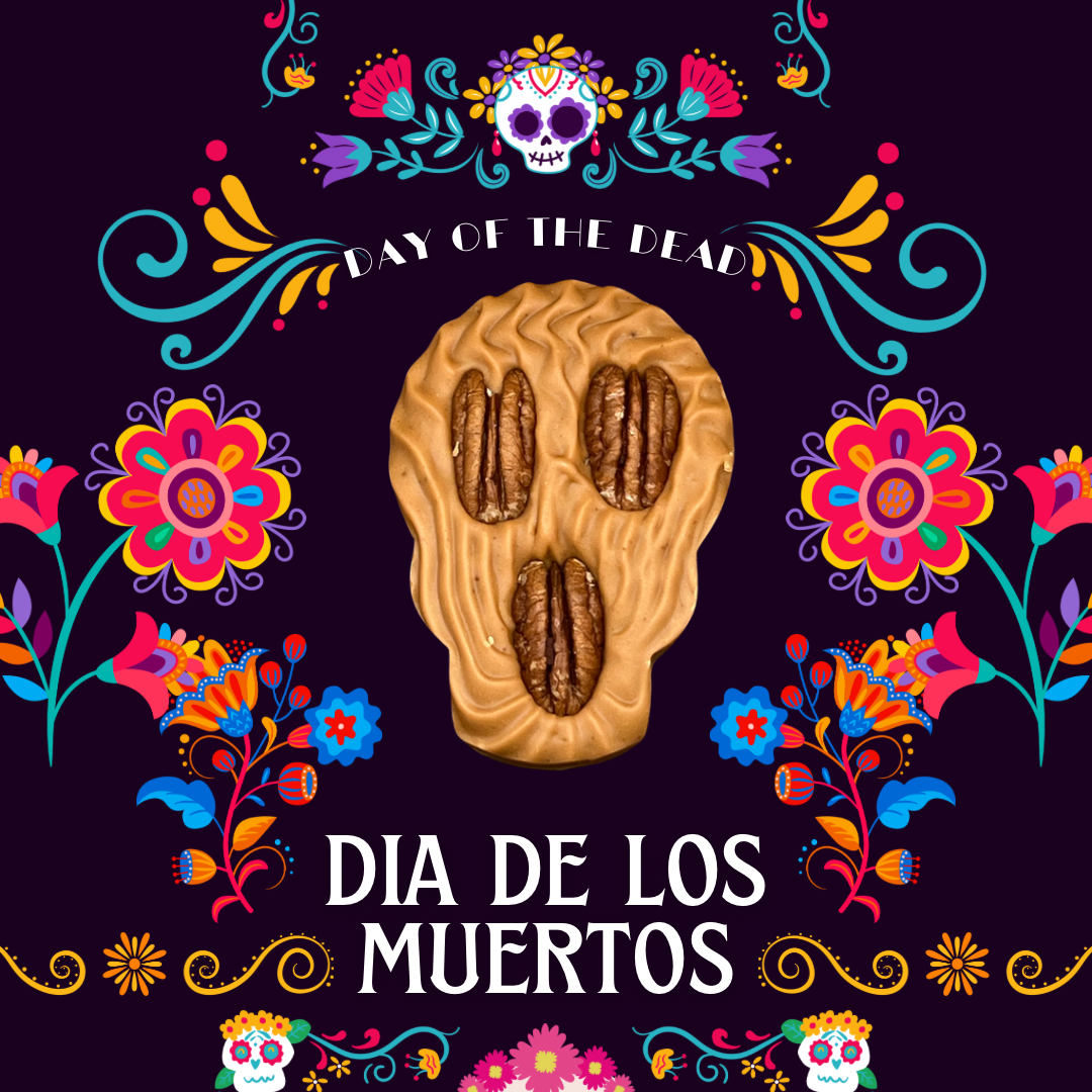 Día de los Muertos artwork: a pecan jamoncillo calaverita framed by folk-art marigolds and papel picado on deep purple